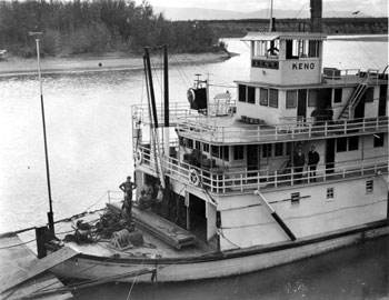 “Another shot of the Keno. I wanted to show the upper decks. Capt. Morrison & Chief Steward. This will give a stranger some idea of what our boats are like. Rather an unusual angle isn't it?”