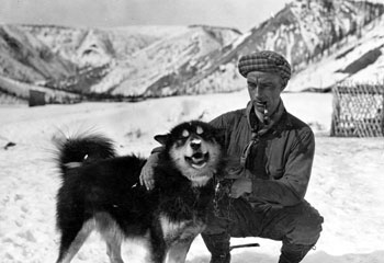 “There′s a land where the mountains are nameless, And the rivers all run God knows where. Service, my Husky Dog.” Claude's caption quotes Robert Service, the namesake of his dog.