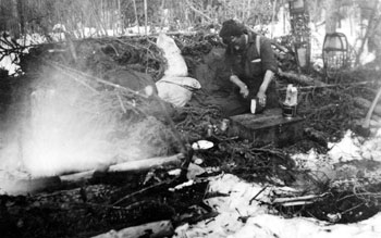 “An ′open′ camp - myself making dinner - April 1920”