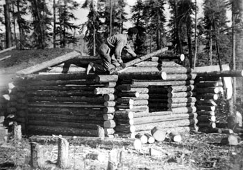 “Putting on the roof poles.”