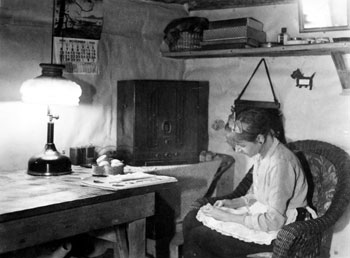 “Looks very comfortable inside.” Mary inside the completed cabin at Twelve Mile.