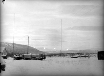 The progress of the sun photographed at intervals between sunrise and sunset at Mayo. December 21, 1935
