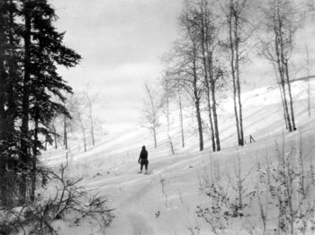 Mary snowshoeing at Ross River.