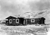 Roy Buttle's store. Mary's inscription reads: “Claude enlarged this on to art paper and then colored it with oils. I framed it – and we gave it to Roy for Christmas. He seemed much pleased as it is his beloved store.”